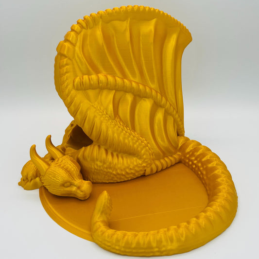 3D-gedruckte Halterung für Bücher in Form eines schlafenden Drachens in Gold
